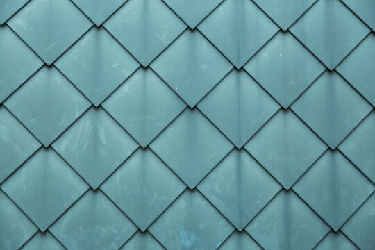 Diamond shaped fish scale tiled wall texture background
