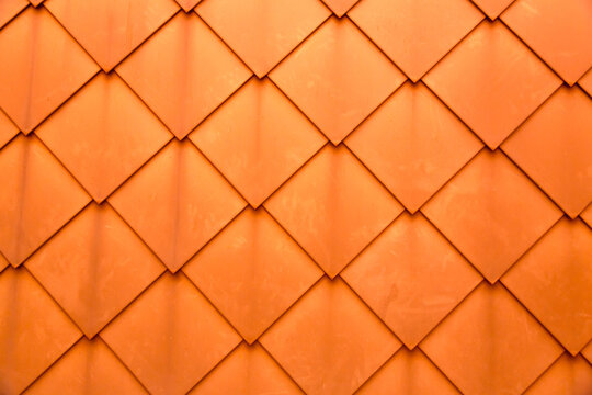 Diamond shaped fish scale tiled wall texture background