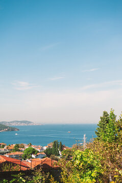 Seaside house overlooks blue horizon