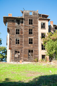Abandoned wooden building with weathered facade showing decay and forgotten charm