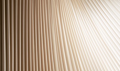 Fototapeta premium Pleated texture, light and shadow play across neutral-toned, parallel lines