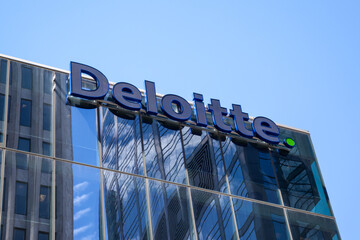 Naklejka premium Toronto, Ontario, Canada - June 19, 2018: Closeup of Deloitte sign on the building in Toronto, Ontario, Canada. Deloitte is a British multinational professional services network. 