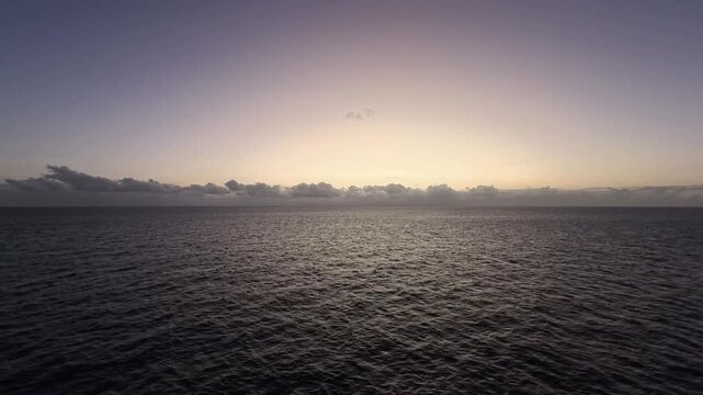 Calm ocean seascape at twilight with soft sky gradients