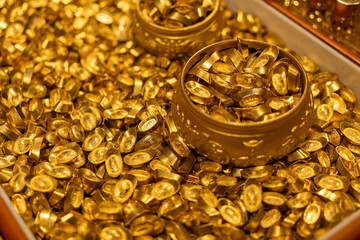 Piles of Traditional Chinese Gold Ingots and Golden Bowls © onlyyouqj