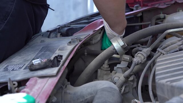 Detailed Examination and Maintenance of a Vehicle's Engine Components, Focusing on Repairs within the Hood and Essential Automotive Techniques for Efficient Performance