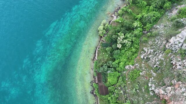 Top Down Drone View of Lin Peninsula Surrounded by Lake Ohrid Albania