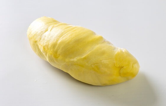Durian the king of fruit in Thailand. Pulp of fresh Durian yellow color on dish isolated on white desk background
