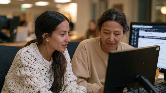 Paralegal student volunteering at courthouse self-help legal clinic, guiding pro se litigant through small claims form completion, side-by-side desk setting, afternoon natural light, supervised skil