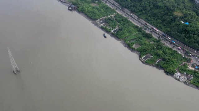 Kalwa Creek aerial drone view in Thane Maharashtra India
Drone shot of Kalwa Khadi waterfront landscape in Thane