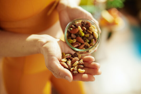 Woman Holding a Jar of Gourmet Mixed Nuts