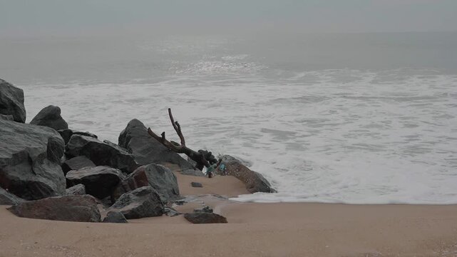 Waves Gently Reaching the Shore at Kovalam Beach