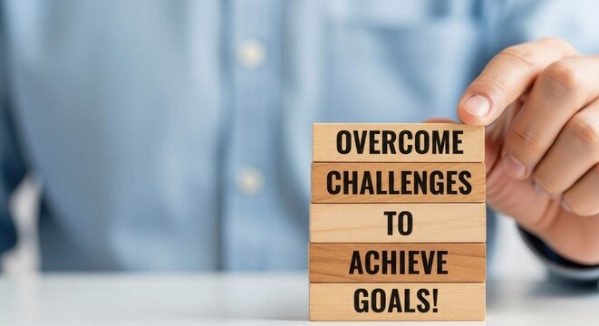 Overcome challenges to achieve goals motivational wooden blocks concept