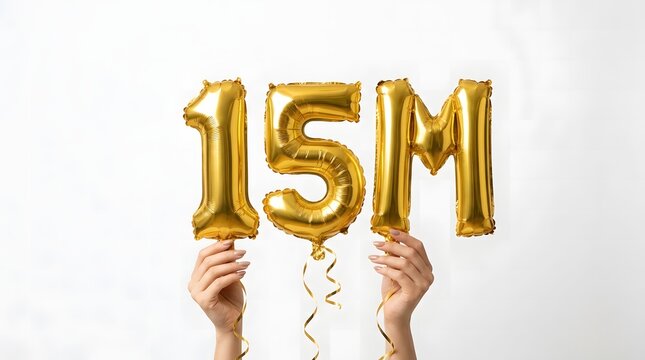 Fifteen million celebration golden foil balloons held by hands