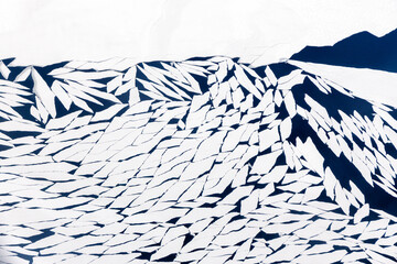 Aerial top-down view of broken sea ice forming abstract white patterns in dark water near Aasiaat, Qeqertalik, Greenland © vadim.nefedov