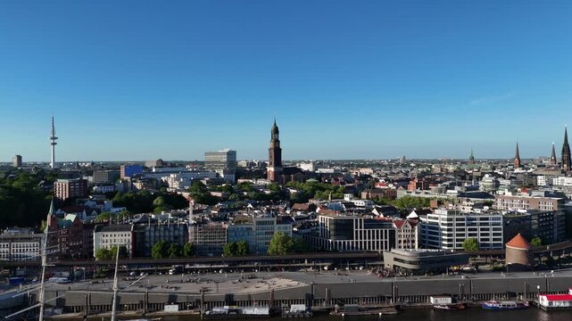 Rising side move above Landungsbrucken church tower