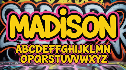 graffiti style font on urban wall street art yellow pink letters alphabet text artwork background colorful bold edgy vibrant culture expression © DesignHub