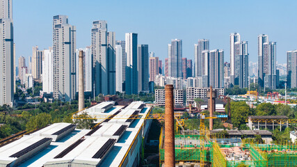 Naklejka premium Modern Skyscrapers Surrounding Former Hanyang Iron Works Industrial Site