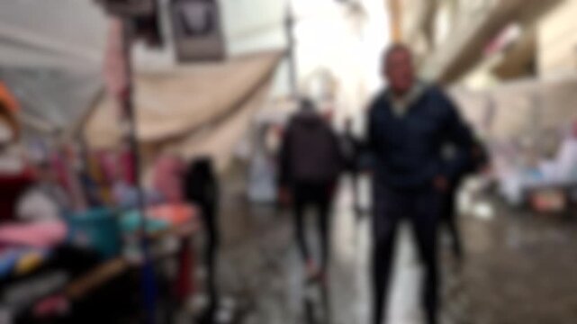 Crowded Market Alley in La Paz Bolivia with blurred shoppers, Colorful Souvenirs, Plastic Covered Stalls and Wet Stone Street, South American Urban Shopping Scene, Travel Photography Background