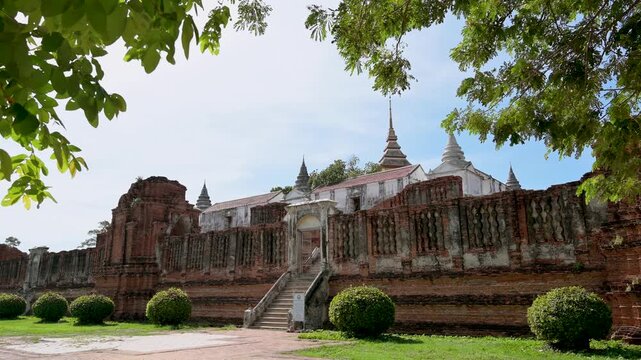 Discover the Grandeur of Thailand: Ancient Ruins of Prasat Nakhon Luang Castle with Red Brick Walls and Mandapa, Ayutthaya Historic Site