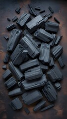 Obraz premium Charcoal Blocks and Chips for Cooking and Barbecue Preparation