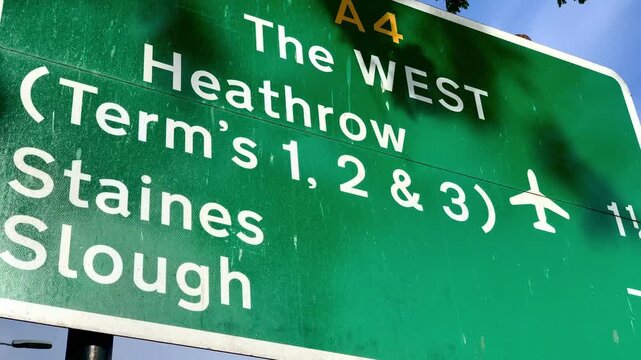 The West, Staines (Staines-Upon-Thames), Slough, Great West Road, Green Motorway Direction Sign, UK Highway Signage, West London, England, United Kingdom