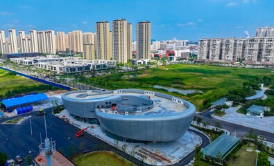 Aerial View Modern Sports Hub with Residential Towers and Wetlands © LeVan