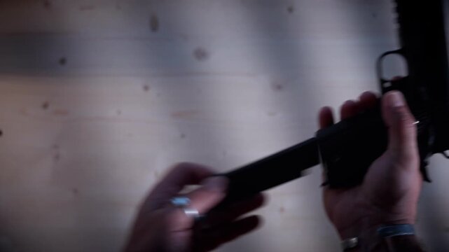 Close-up Handgun Maintenance for Underground Weaponry Dealing