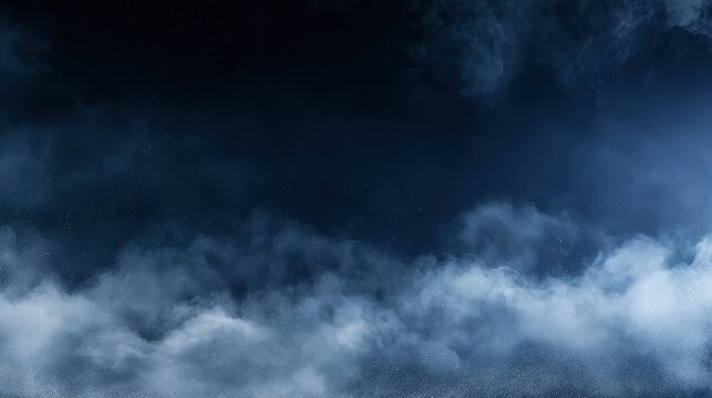 Fog covers a dark space while tiny particles float in the air in the night time