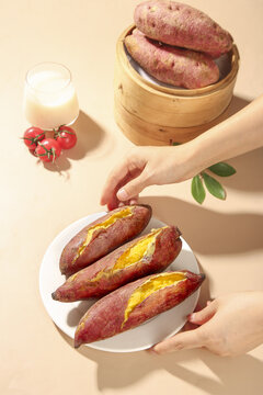 Fresh Cooked Sweet Potatoes with Golden Yellow Flesh on White Plate - Healthy Organic Food