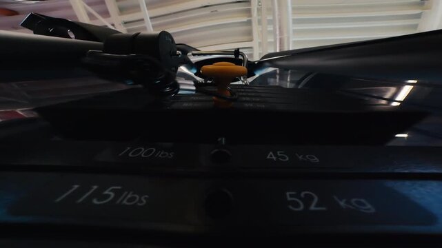 During Strength Workout, Weight Stack Plates Move Up And Down On Cable Machine