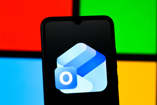In this photo illustration, the Microsoft Outlook logo is seen displayed on a smartphone screen.