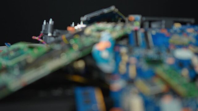 Aftermath of AI booming economy, e-waste pile of computer components with valuable rear earth metals, sustainability issues. Data centers powering AI upgrades and equipment replacements concept.