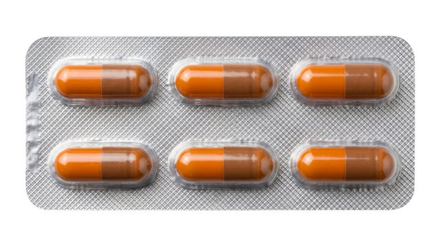 Orange and brown pharmaceutical capsules in a silver blister pack on a transparent background PNG file