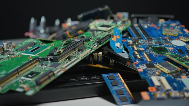 Exploding E-waste due AI boom and AI datacenters development worldwide. Obsolete or broken servers parts, chips, cooling and circuits with CPUs. Pile of hardware for possible recycle.
