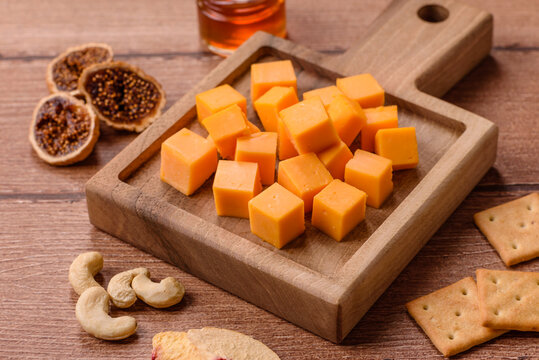 Hard yellow cheddar cheese for sandwiches or pasta. Cheddar cheese