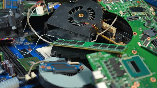 Exploding E-waste due AI boom and AI datacenters development worldwide. Obsolete or broken servers parts, chips, cooling and circuits with CPUs. Pile of hardware for possible recycle.