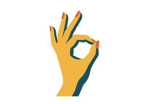 A hand with orange nails makes an okay sign