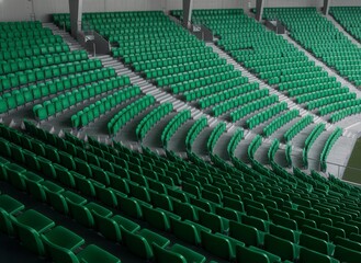 Fototapeta premium Empty Green Stadium Seats in Modern Arena, Perspective View