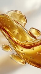 Obraz premium Abstract splash stream of golden viscous oil liquid with micro air bubbles floating fluid movement isolated on bright white backdrop close up high speed macro dynamic wave shot studio product