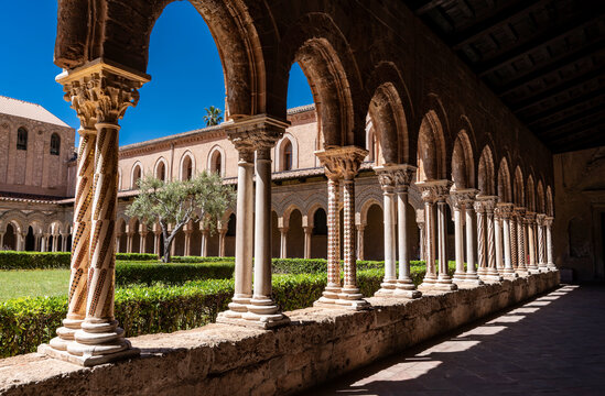 Cloister of Monreale Cathedral with historic decorated columns and arches, Palermo, Sicily, Italy