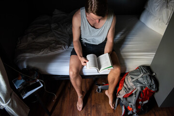 Man reading book in solitude. © Rawpixel.com