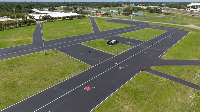 Aerial view of empty asphalt driving course

