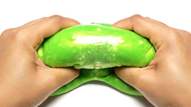 Hands stretching vibrant green slime in a mesmerizing cinematic slow motion loop for sensory relaxation content