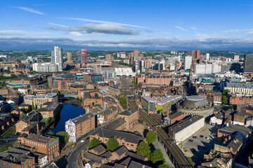 Fototapeta premium Leeds city centre, West Yorkshire, England, viewed from the east across the River Aire. Aerial view of the skyline, commercial districts and modern urban development.