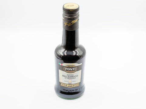 Ponti Aceto Balsamico di Modena vinegar bottle closeup on white.