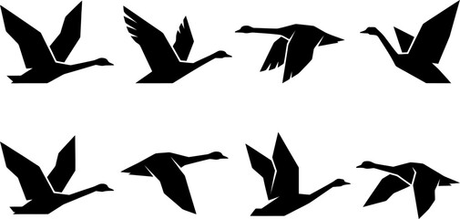 Set of eight geometric origami style swan silhouettes in various graceful flying positions © Vecto_Pixels