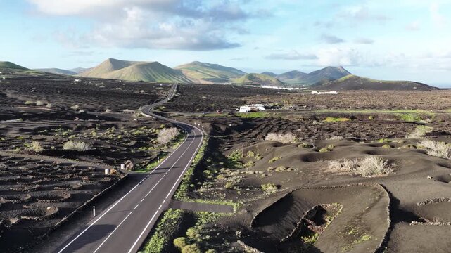 Lanzarote volcanic vineyards and scenic road in La Geria