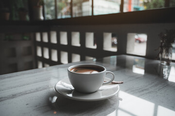 Fototapeta premium TAZA DE CAFÉ Y GRANO DE CAFÉ