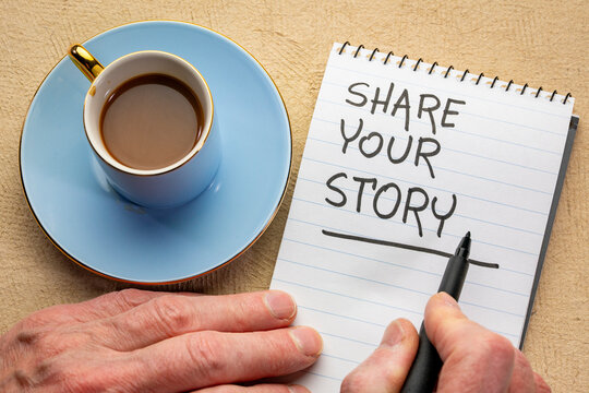 share your story - motivational handwriting in a spiral notebook with a cup of coffee