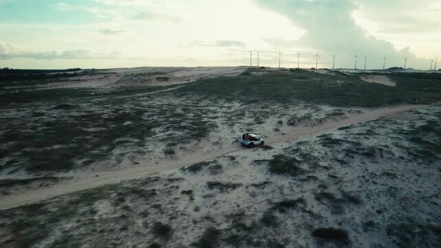 Off Road Buggy Driving Across Coastal Sand Dunes in Brazil